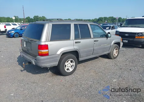 1997 Jeep Grand Cherokee Laredo/Tsi из США, поврежденный, VIN 1J4GZ58S9VC742825